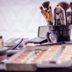 makeup brush on black container