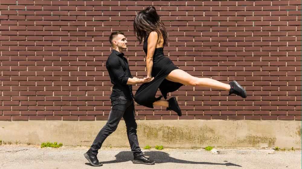 Modern jazz dance styles with dynamic outfits.