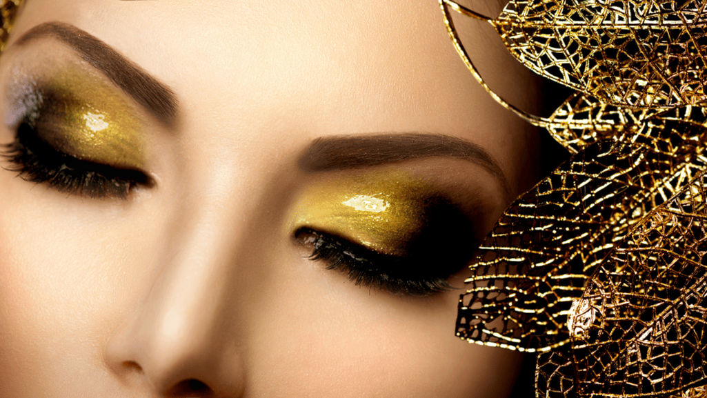A close-up view of various glitter eyeshadows showcasing their sparkling textures and colors.